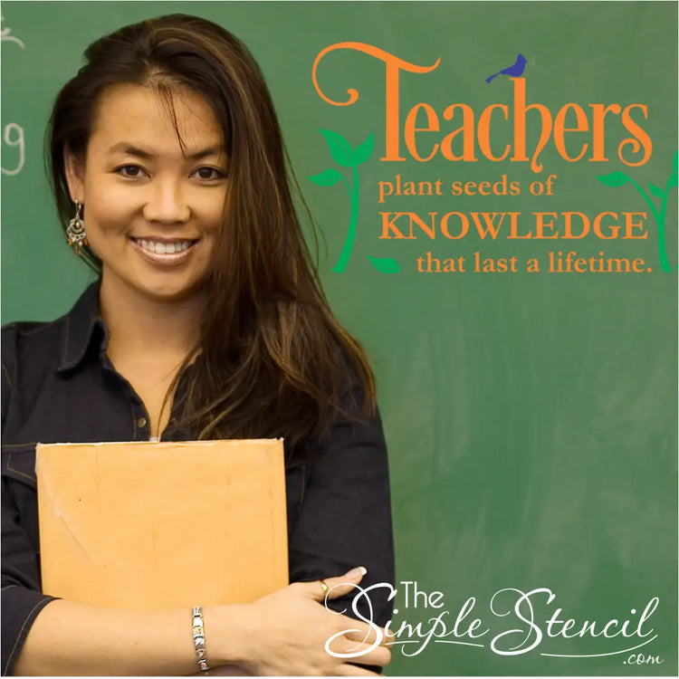 "Teachers Plant Seeds" inspirational wall decal displayed on a school  chalk board next to a smiling teacher it was gifted to. By The Simple Stencil