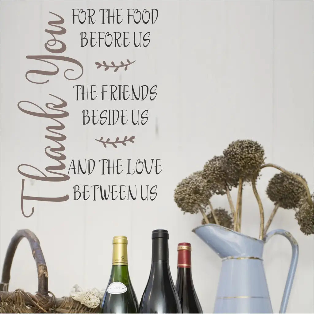 Beautiful vinyl wall art decal by The Simple Stencil reads: Thank you - for the food before us, the friends beside us and the love between us.