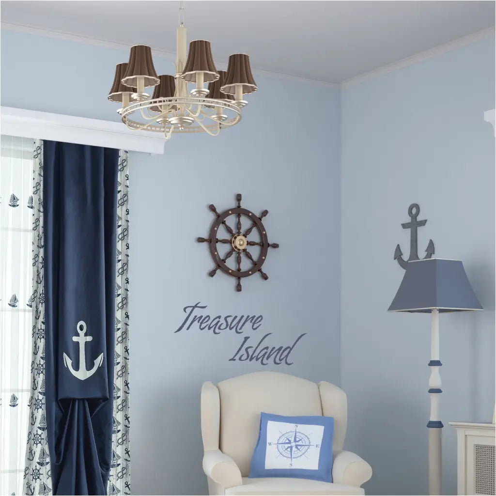 Treasure Island vinyl wall decal by The Simple Stencil applied to a blue pirate themed boy's room and really adds a finishing touch to the decor.