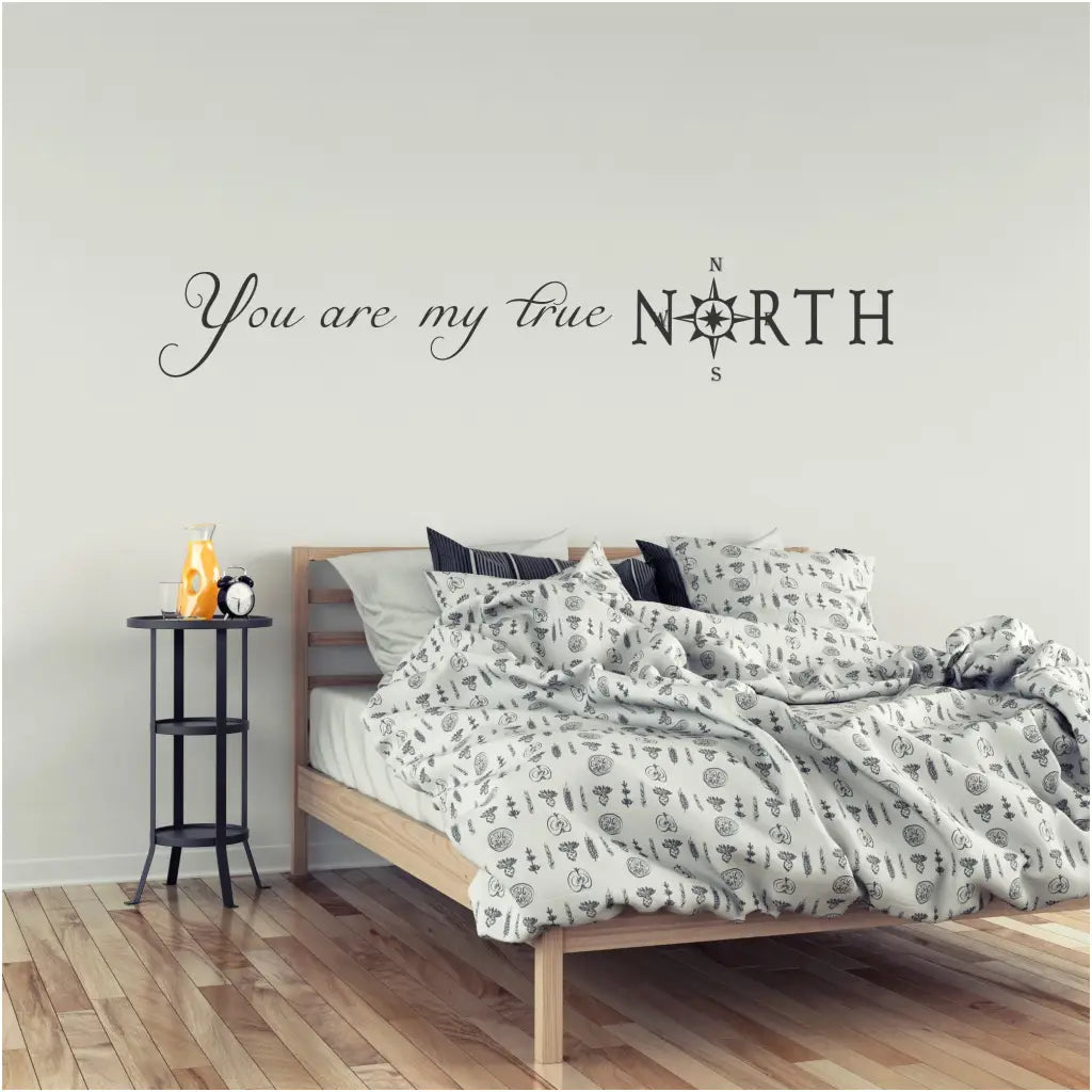 You are my true North (with compass) vinyl wall decal by The Simple Stencil shown displayed on a beautiful master bedroom wall. 