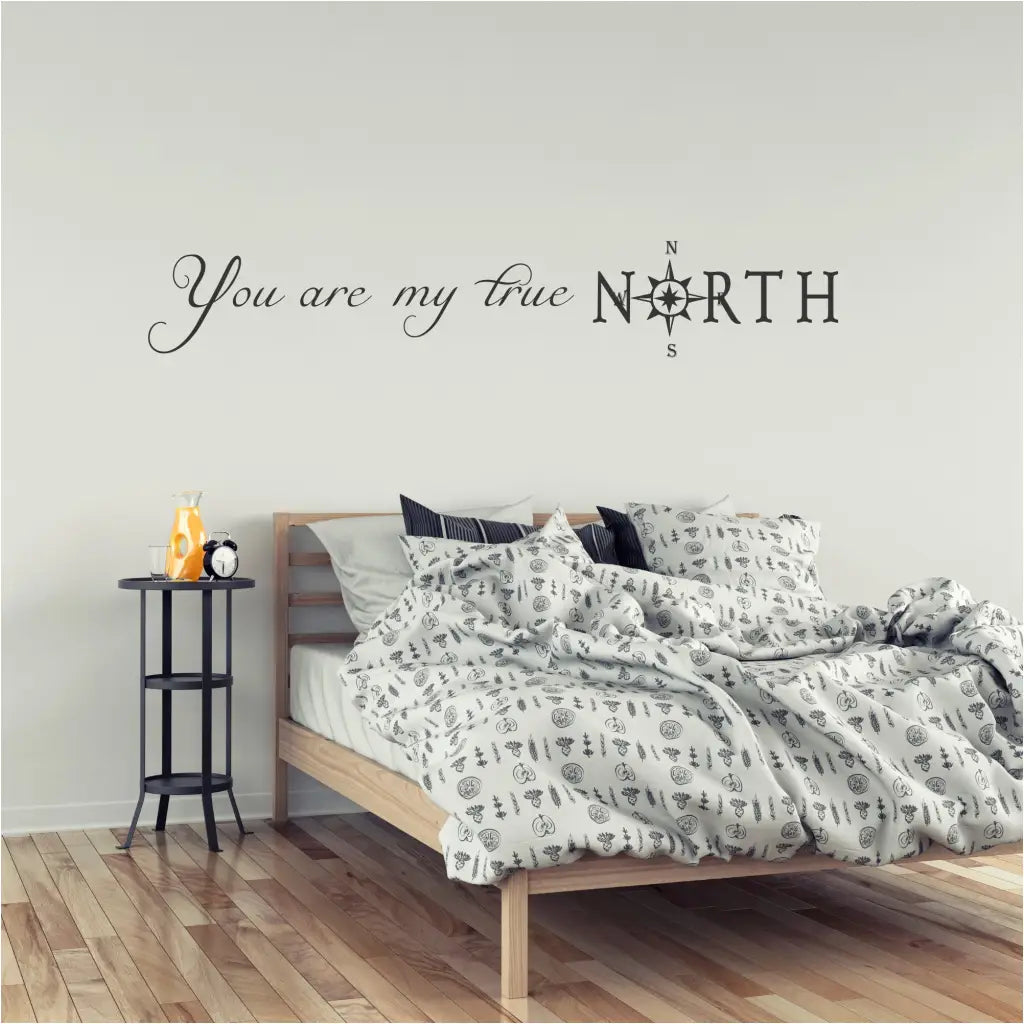 You are my true North (with compass) vinyl wall decal by The Simple Stencil shown displayed on a beautiful master bedroom wall.