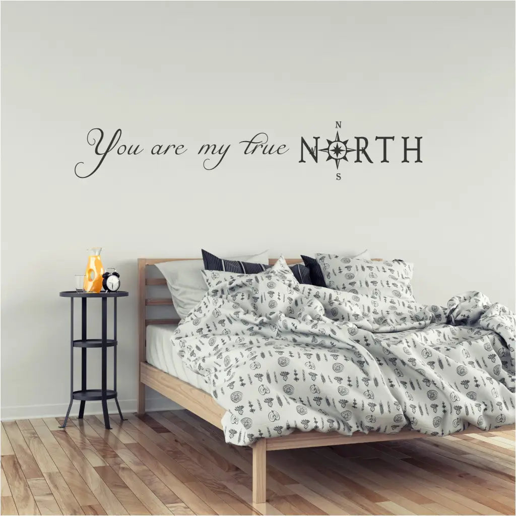 You are my true North (with compass) vinyl wall decal by The Simple Stencil shown displayed on a beautiful master bedroom wall. 