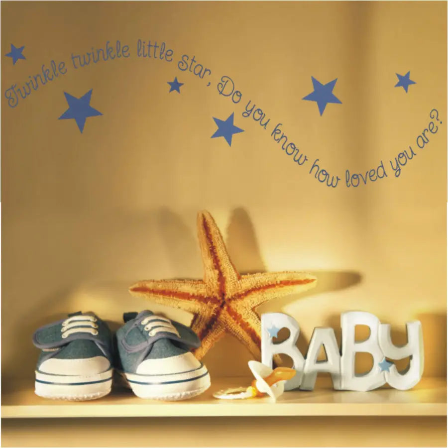 Twinkle twinkle little star, do you know how loved you are? A cute vinyl wall decal with stars in a wavy pattern by The Simple Stencil makes a great display on baby's nursery wall!