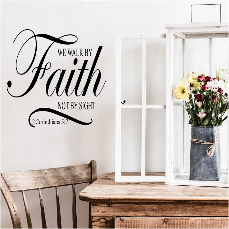 We walk by faith, not by sight. 2 Corinthians 5:7 Scripture wall decal to add an inspirational message of faith to the walls of your home or church. Many sizes and colors available at The Simple Stencil