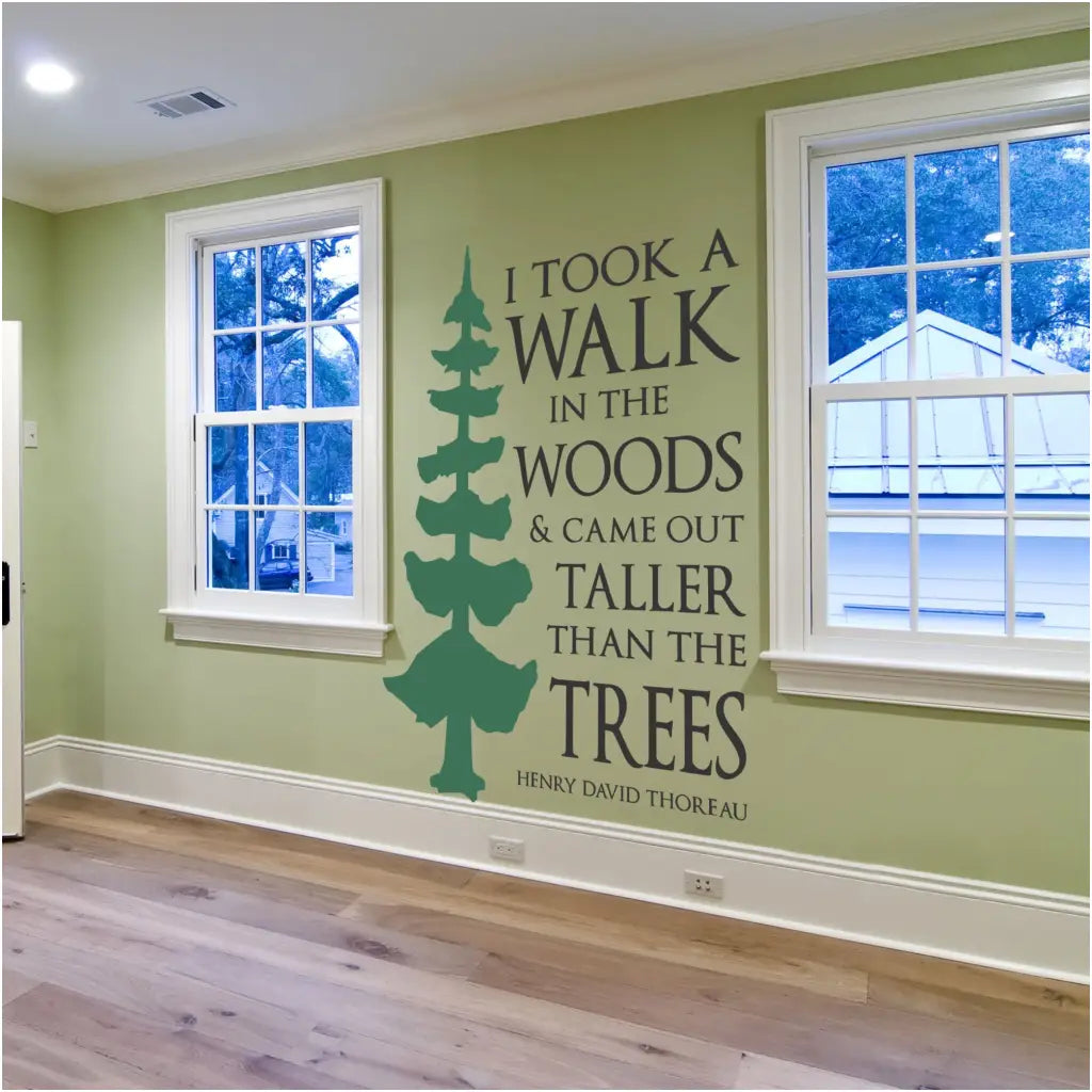 I took a walk in the woods & came out taller than the trees. Henry David Thoreau quote made into a beautiful vinyl wall decal that includes a large tree decal graphic alongside this inspirational quote by Thoreau