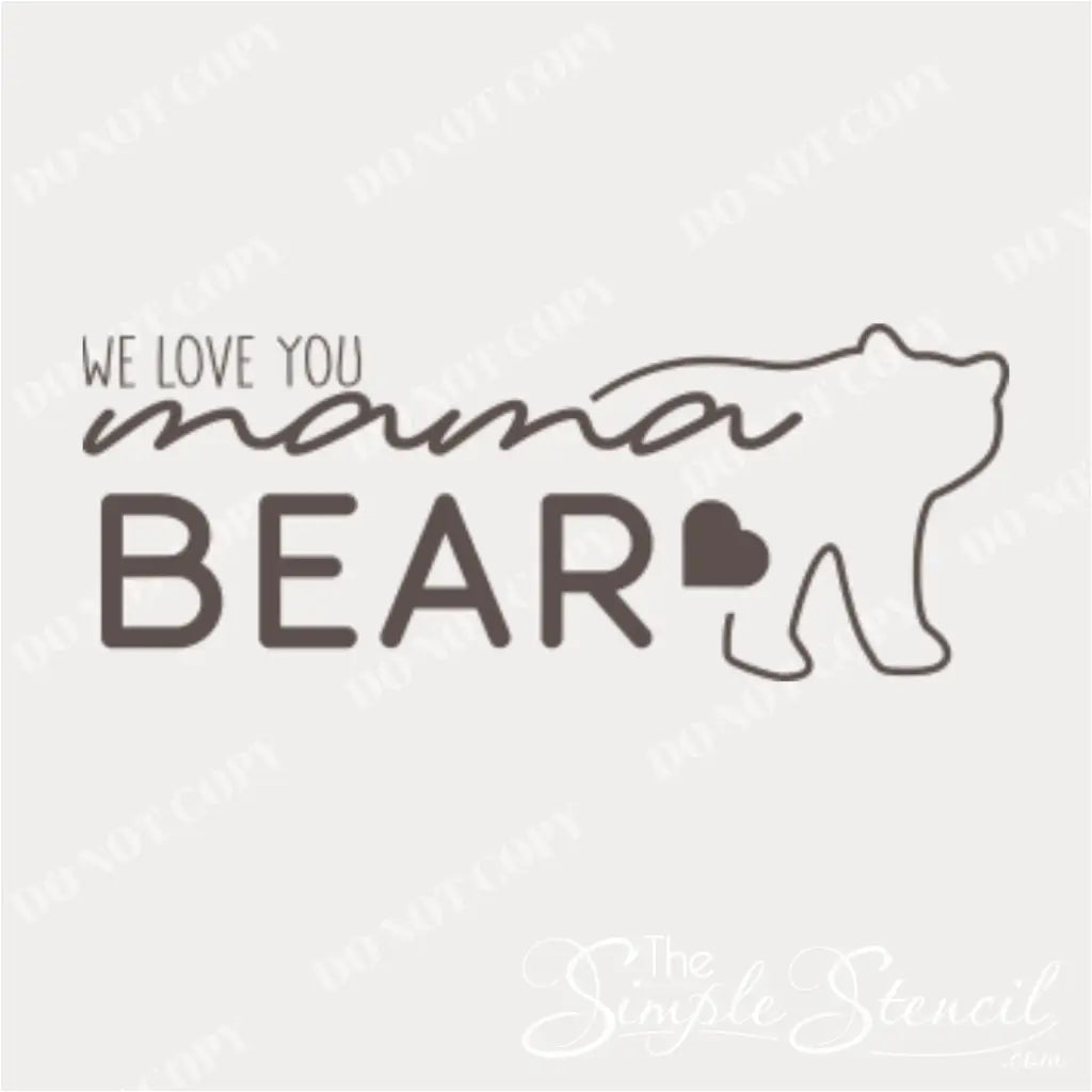 Close-up of the "We Love You Mama Bear" wall decal in vinyl, highlighting the playful font, bear outline and hearts in the design.