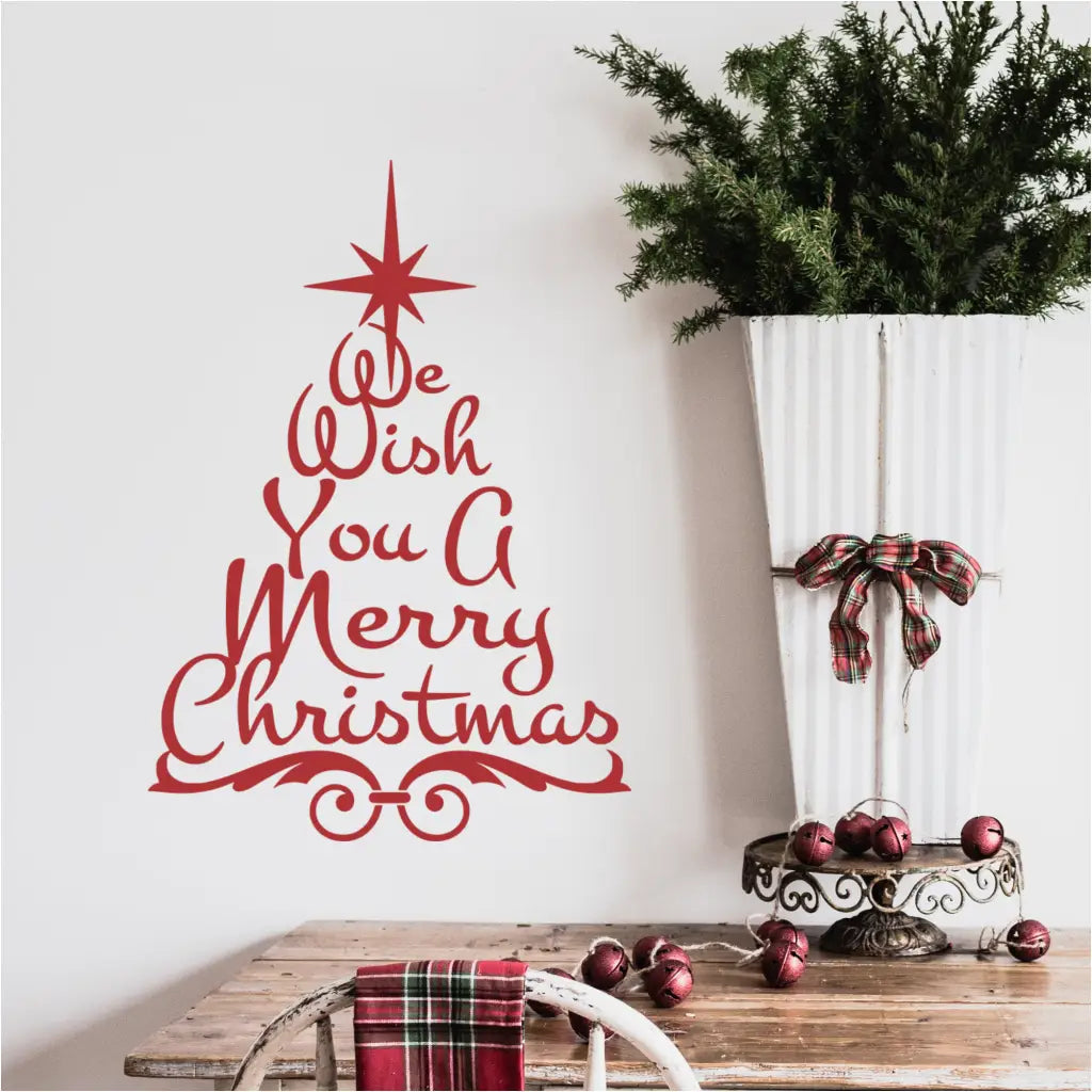 Beautiful tree art for Christmas that reads: We wish you a merry christmas in the shape of a christmas tree. Easy to install and remove makes this the perfect christmas tree decor for small apartments or business entryways.