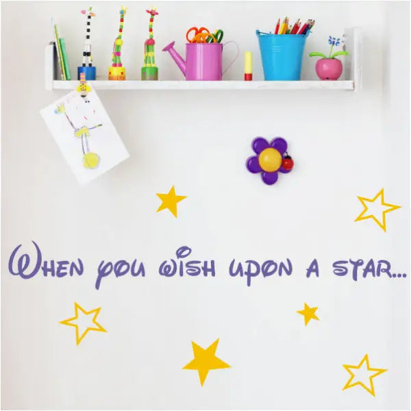 When you wish upon a star wall decal with stars surrounding in a child's room decor.