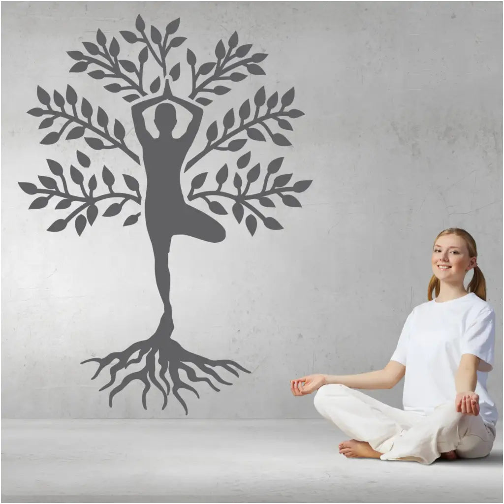 Yoga Tree self adhesive wall decal displayed on a yoga studio wall to create a focal point. Many sizes and colors to choose from!