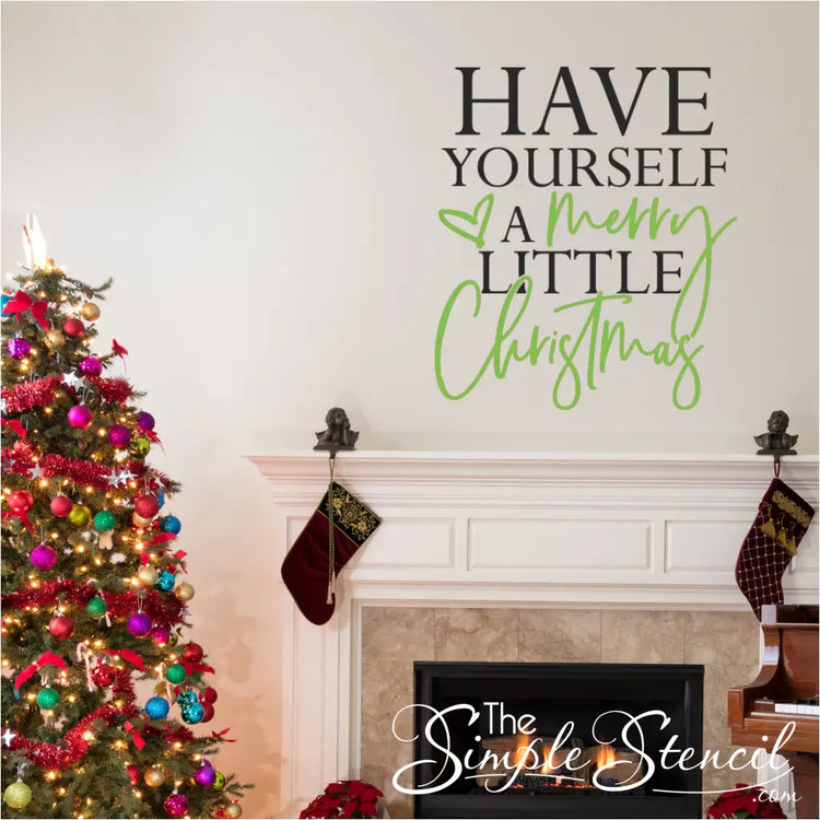 Black and light green holiday quote decal above a mantle with stockings and a Christmas tree. This festive vinyl lettering is perfect for family room holiday decoration and has a classic Christmas song message.