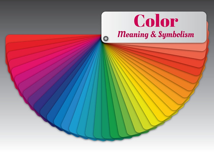 Colorful fanned paint swatch wheel showcasing a spectrum of shades with a label reading "Color Meaning & Symbolism" for room decor color psychology.