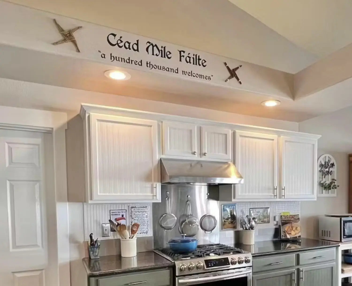 A beautiful wall decal submitted by a lucky customer who won our Wall of Fame contest for the month of March - Beautiful kitchen with wall quote decal that reads Cead Mile Failte 