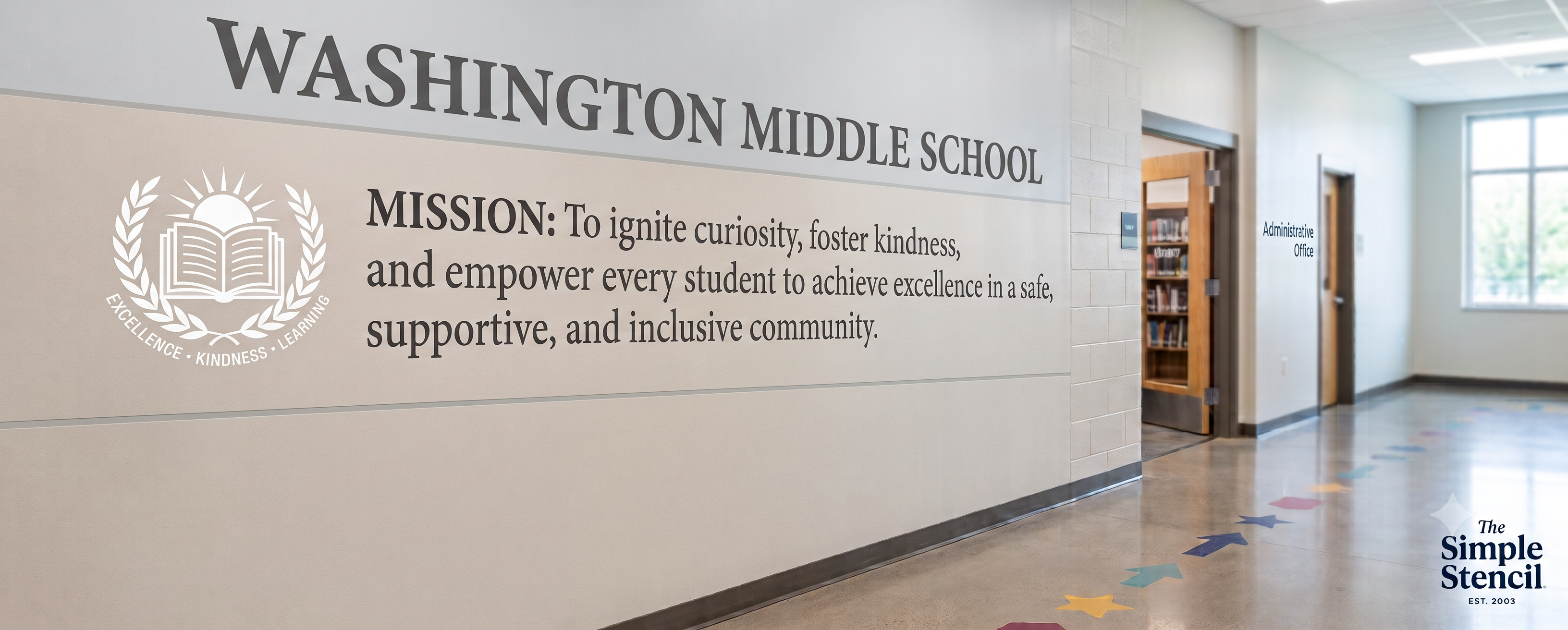 Custom matte vinyl school mission statement and mascot emblem installed on a painted cinder block wall in a Washington Middle School hallway, featuring damage free wall decor with a painted-on look.