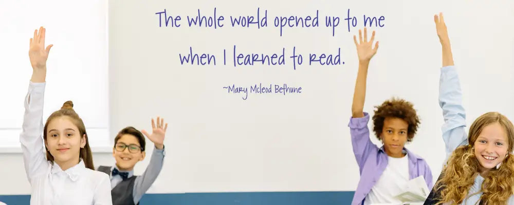 Language Arts classroom wall decal featuring the Mary McLeod Bethune quote 'The whole world opened up to me when I learned to read' displayed above diverse students with raised hands in a school setting.