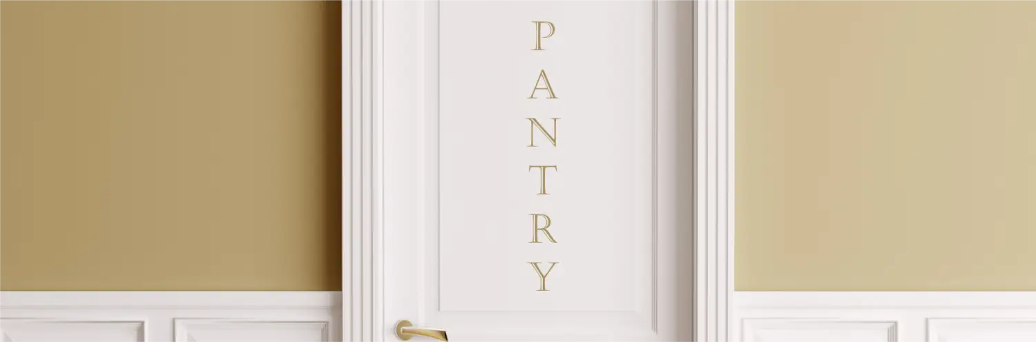 Beautifully designed vinyl wall and door decals for kitchen and restaurant pantry decorating. PANTRY applied vertically to a white door to help guests find the snacks!