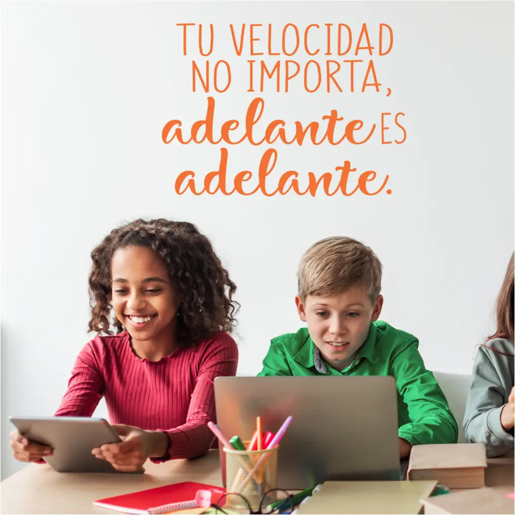 A spanish translation wall decal of an inspiring wall quote for schools and workspaces that reads: Tu velocidad no importa, adelante es adelante. English translation is Your speed doesn't matter, forward is forward. By The Simple Stencil