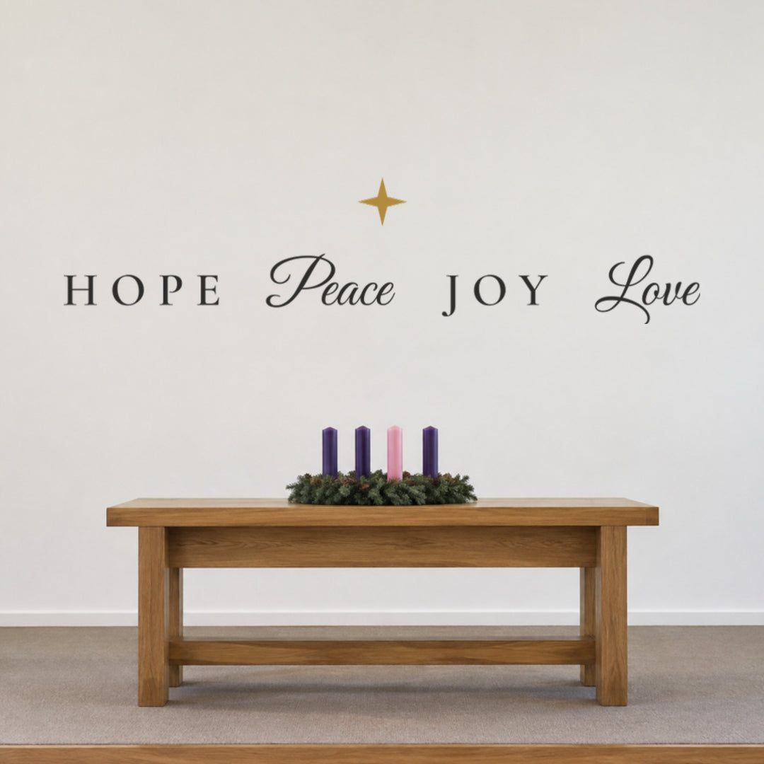 Hope Peace Joy Love Advent wall decals hung in one row with a gold star above a church communion table and Advent wreath