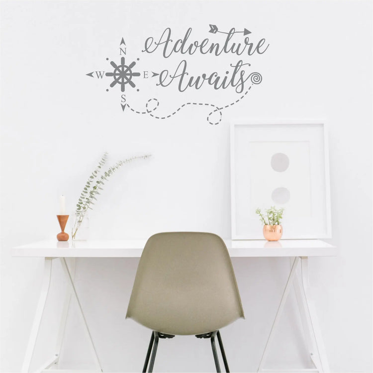 Adventure Awaits Wall Decal Sticker - Easy to install wall decal that reads: Adventure Awaits in a whimsical font with arrows and compass. Looks great over a study area or desk. By TheSimpleStencil.com