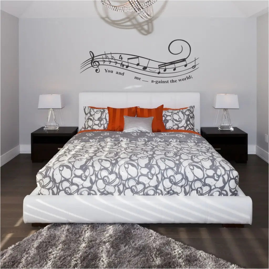 Helen Reddy's Song lyrics "You and me against the world" sheet music wall decal displayed on a master bedroom wall over the bed adds a romantic vibe.