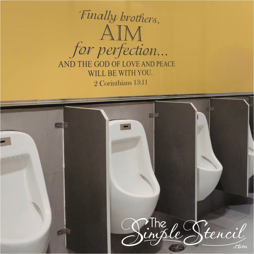 Religious wall lettering applied to a yellow bathroom wall above urinals in a church or facility men's room for a touch of humor and inspiration.