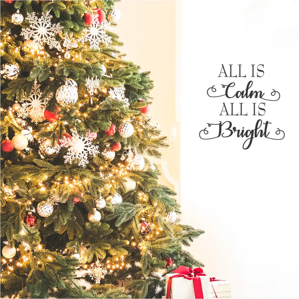 Wall decal featuring the phrase "All is calm, all is bright" in an elegant script font.