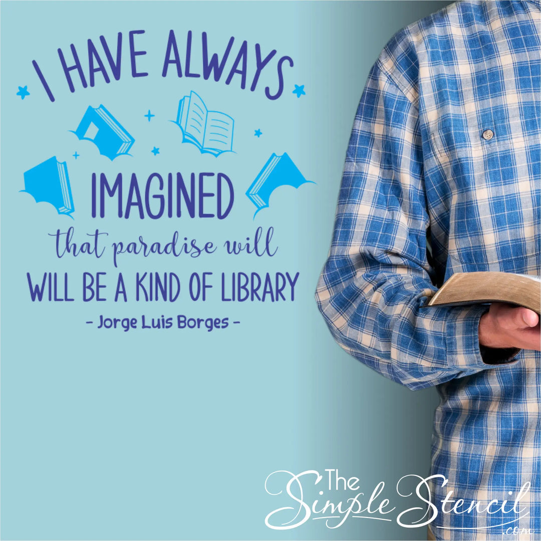 The Borges quote wall decal with graphics applied near a reading man in a home library using two color options of navy and light blue
