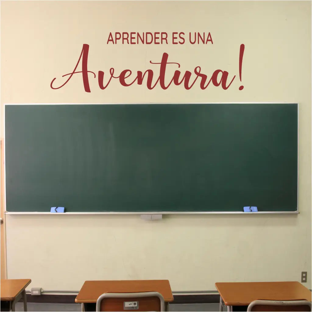 Aprender es una Aventura! - This Spanish version of our Learning is an Adventure! wall decal applied to a school classroom wall to inspire spanish speaking students by The Simple Stencil. 
