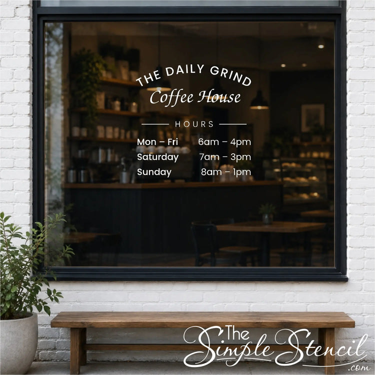 Arched business name and hours vinyl decal on a coffee shop front window