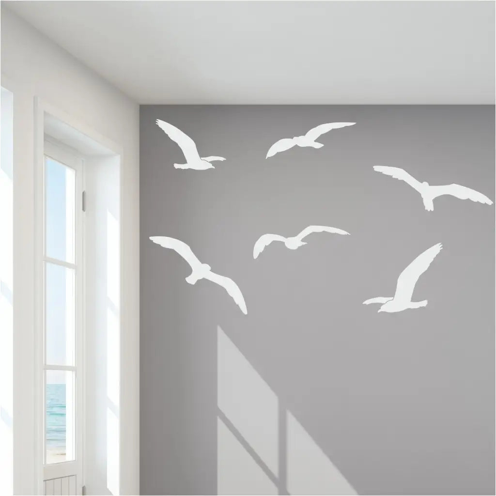 Set of nine soaring seagull decals in your choice of color and size to decorate the walls and windows of your home, beach themed room, etc. Easy to apply, look painted on yet removable when ready for a change! 