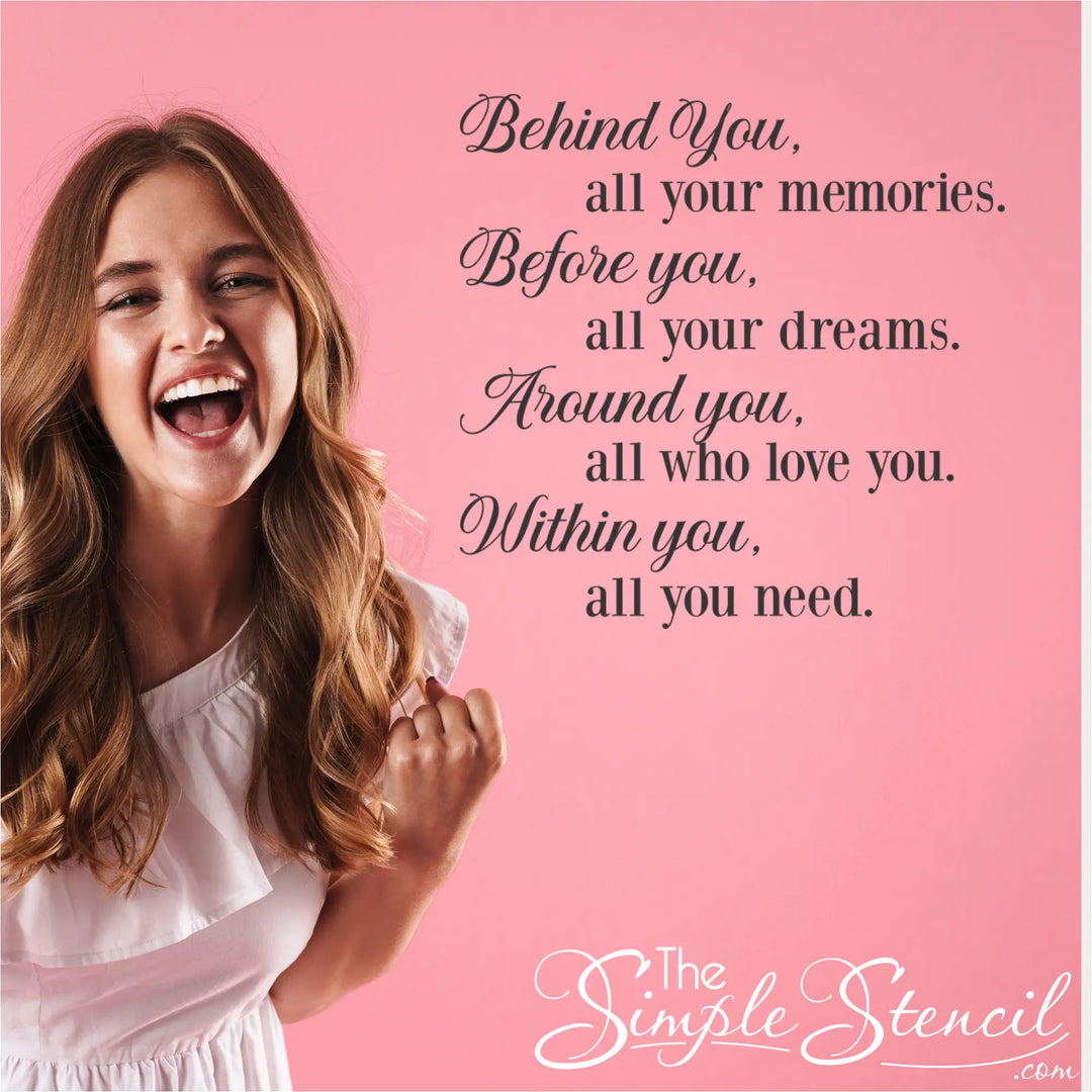 A bright and empowering scene showing a young woman laughing joyfully and celebrating with a raised fist against a solid pink backdrop. To her right, the inspiring quote is displayed beautifully in a sophisticated mix of flowing script and crisp serif typography: "Behind You, all your memories. Before you, all your dreams. Around you, all who love you. Within you, all you need.
