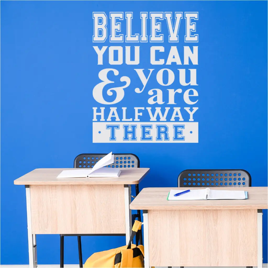 Motivational classroom wall decal displaying the quote 'Believe You Can and You're Halfway There' on a vibrant classroom wall, picture by The Simple Stencil