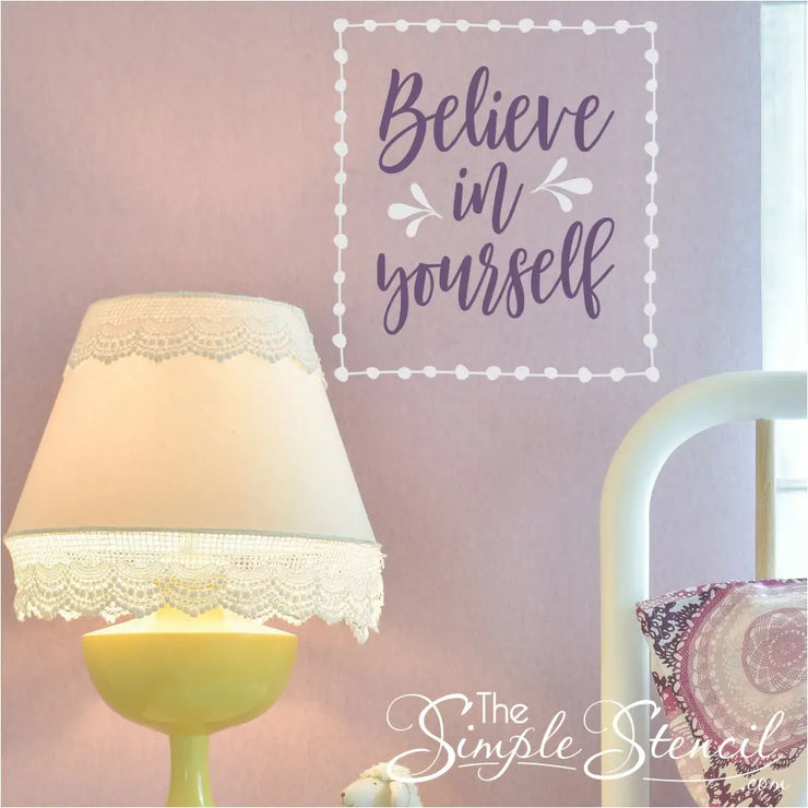 Believe in Yourself vinyl wall decal in white and purple on a pink wall. A great Simple Stencil design for a girls room with it&