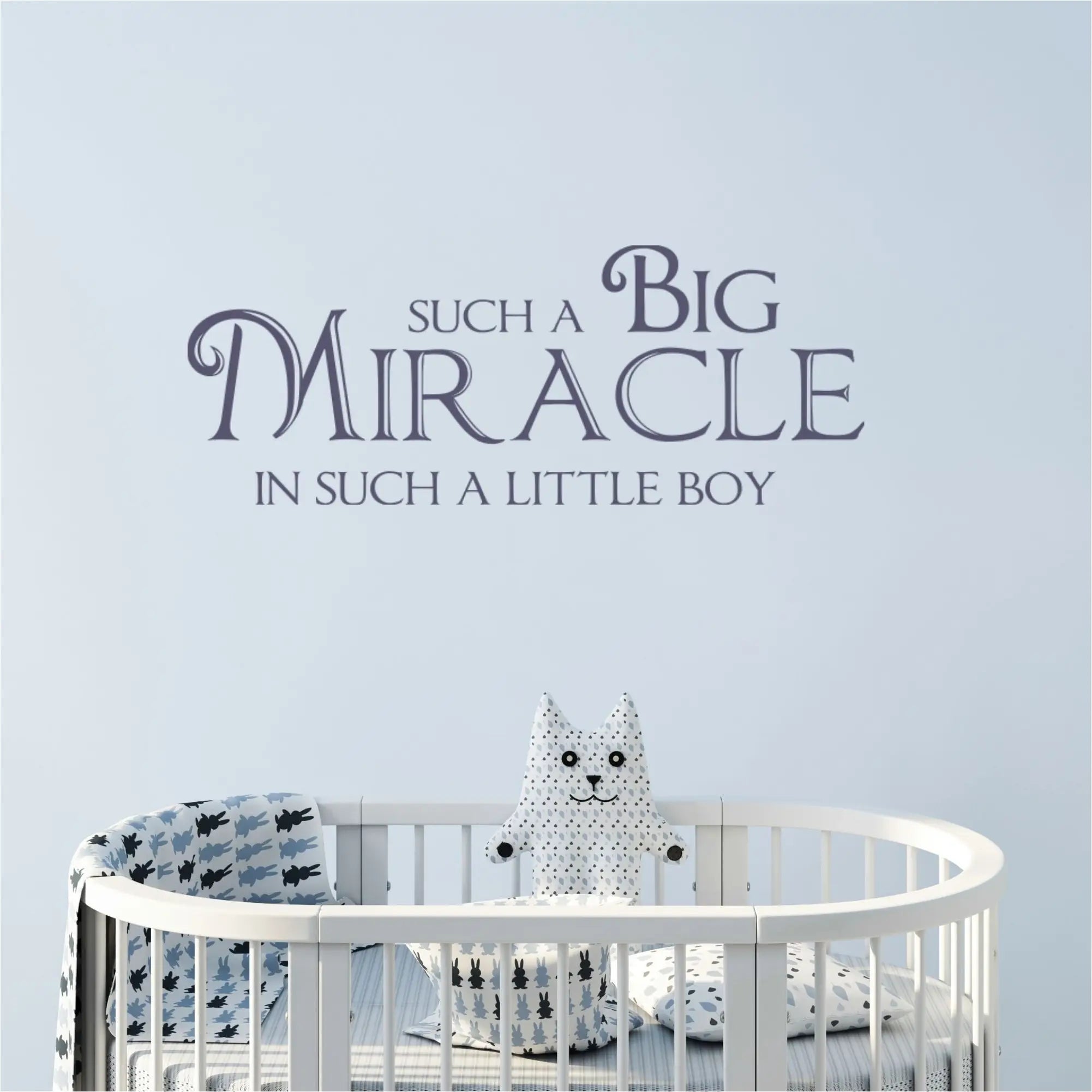 A super cute vinyl wall decal for a baby boy's nursery by The Simple Stencil that reads: Such a big miracle in such a little boy.