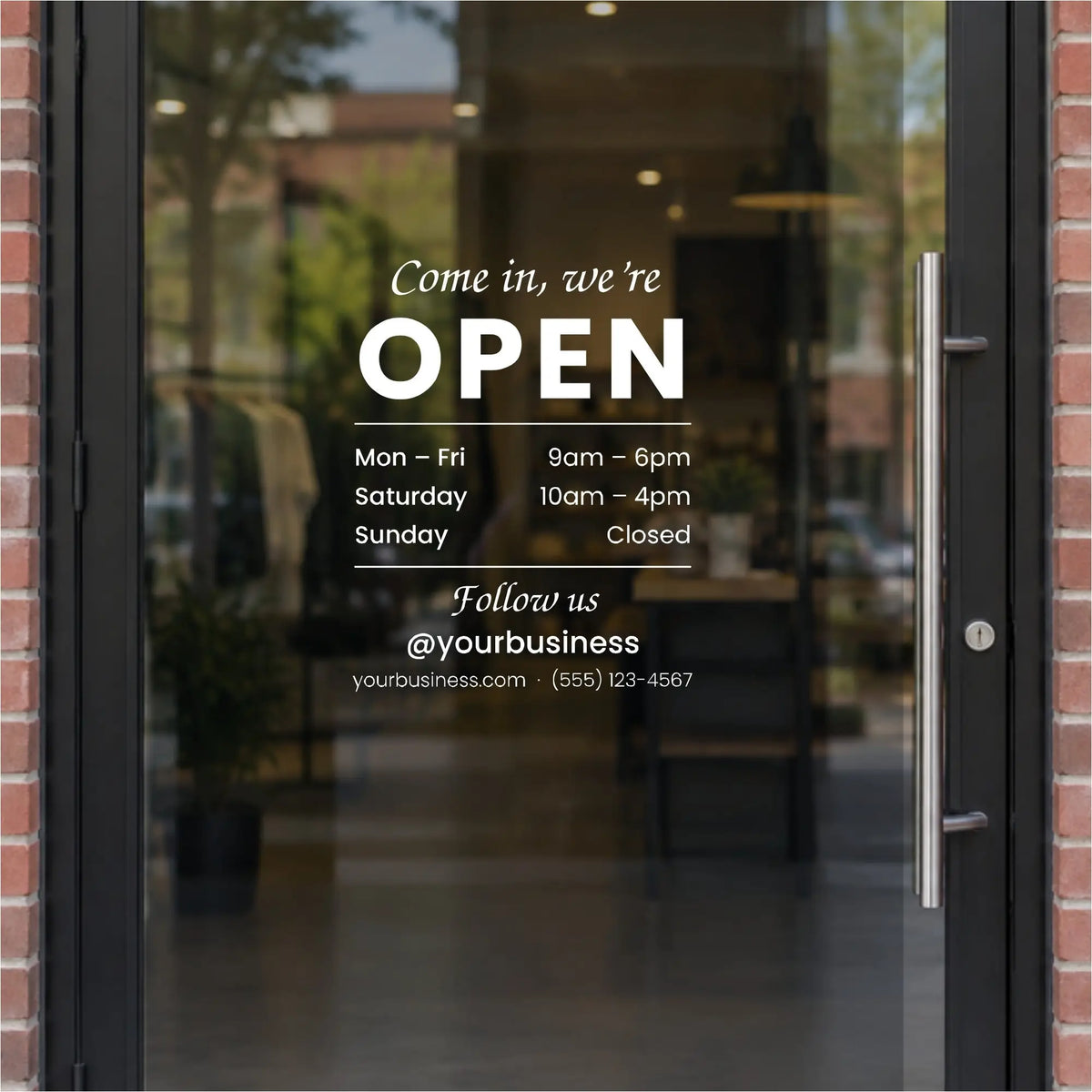 Come in we're open decal with business hours and follow us social handle in white on a glass shop door