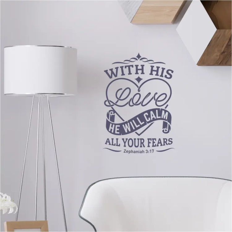 Zephaniah 3:17 wall decal with a heart embellishment, that reads: With His Love He Will Calm All Your Fears - Shown over a sitting area in a family home. 