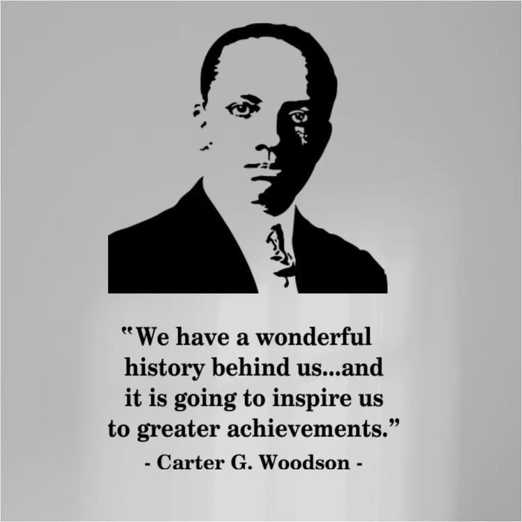 Carter G. Woodson silhouette wall decal paired with his quote "We have a wonderful history behind us..." on a grey wall.