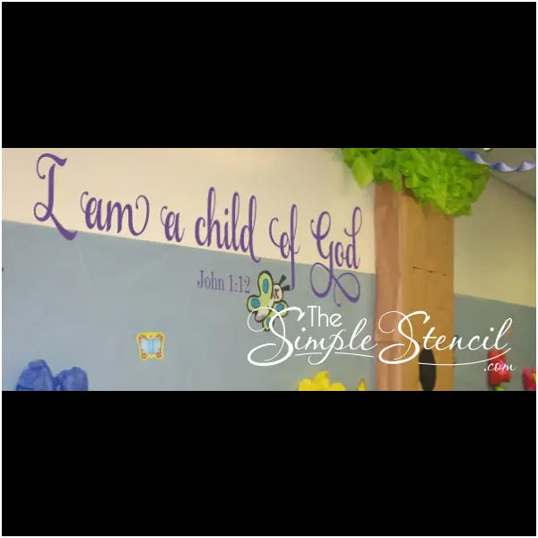 Large "I am a child of God" John 1:12 bible verse wall decal displayed on churches baby nursery looks adorable and is an easy DIY project.