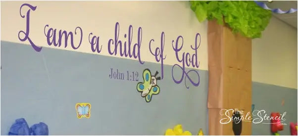 Large "I am a child of God" John 1:12 bible verse wall decal displayed on churches baby nursery looks adorable and is an easy DIY project.
