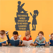 The whole world opened up to me when I learned to read - Library Wall Decor Ideas by The Simple Stencil with boy & girl reading graphic