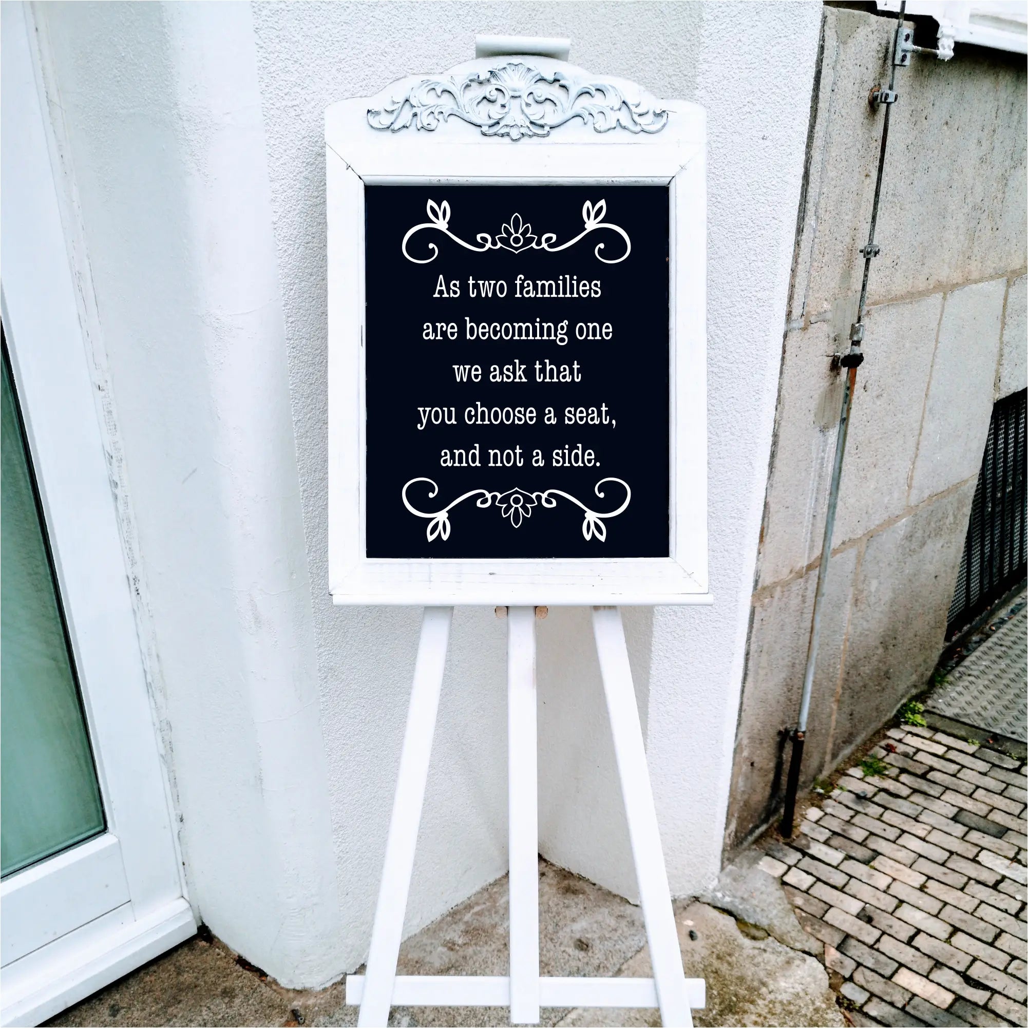Choose A Seat Not Side - A cute wedding sign display to encourage families to mingle at your wedding. Exclusive decal design by The Simple Stencil