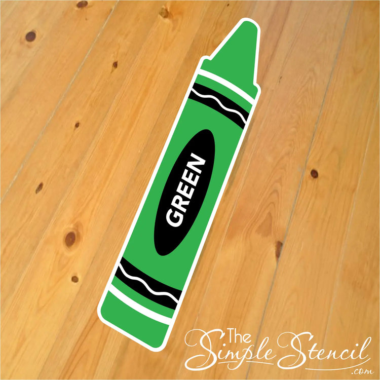 Seven brightly colored crayon decals (pink, red, orange, yellow, green, blue, purple) laid out on a light-colored floor, demonstrating a sensory path for kids to follow.