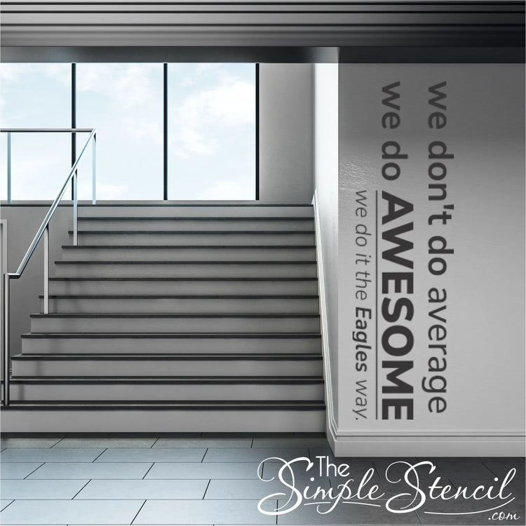 A view of a school hallway featuring a vertically placed "We Don't Do Average, We Do AWESOME The EAGLES WAY" custom wall decal, enhancing the overall school decor and welcoming students.