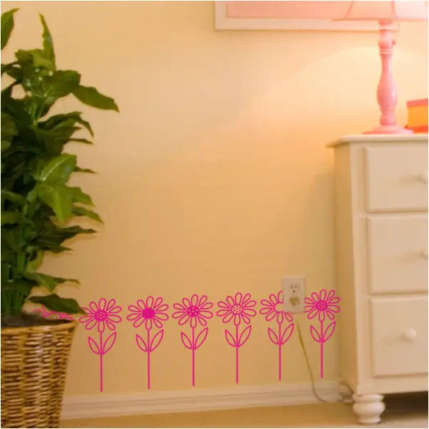Vinyl Daisy wall or window decals by The Simple Stencil work nicely to decorate a little girls' room or to welcome spring!