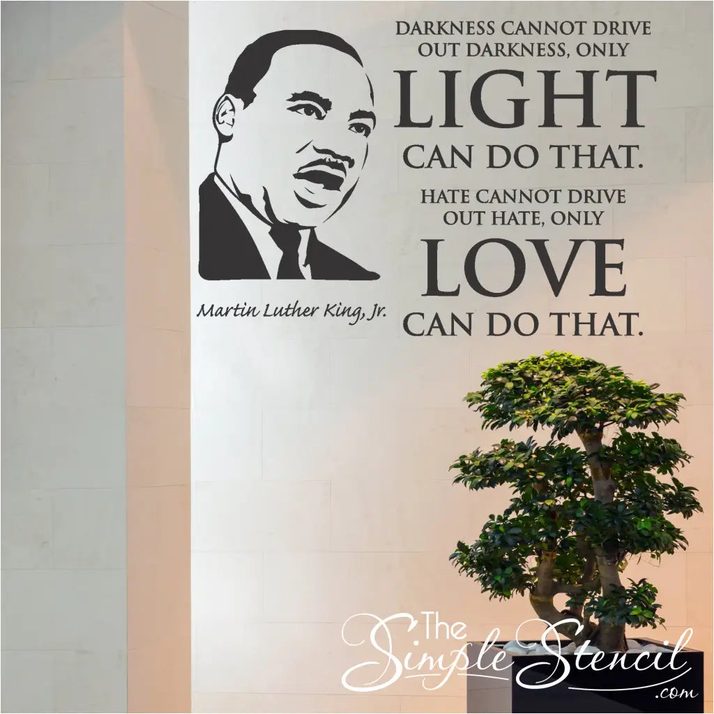 MLK Jr. quote decal subtly placed on a white wall in a minimalist living room.