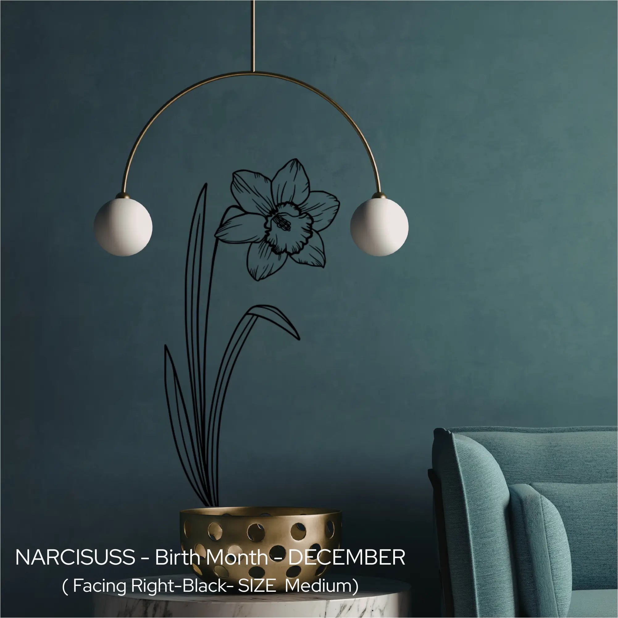 A black Narcissus birth flower wall etching applied vertically behind a modern mobile light fixture on a dark teal wall.