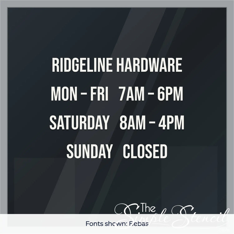 Custom business hours window decal example for a hardware store in Bebas font, white vinyl on glass