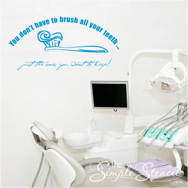 A large decal of a funny brush your teeth reminder for dentist office decorating. Reads: you don't have to brush all your teeth, just the ones you want to keep! 