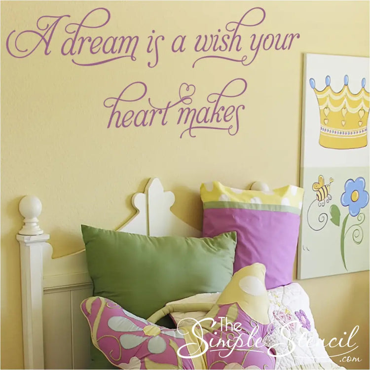 A dream is a wish your heart makes vinyl wall decal applied to wall behind a girls princess themed room.