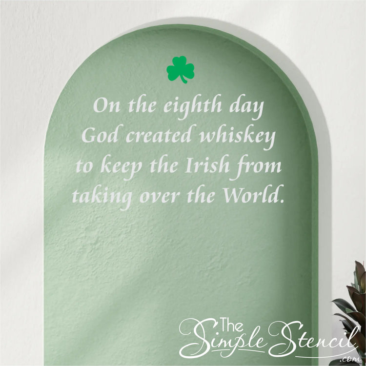 White Irish quote decal centered within a light green arched wall niche, providing a modern and minimalist take on seasonal St. Patrick's Day home styling.