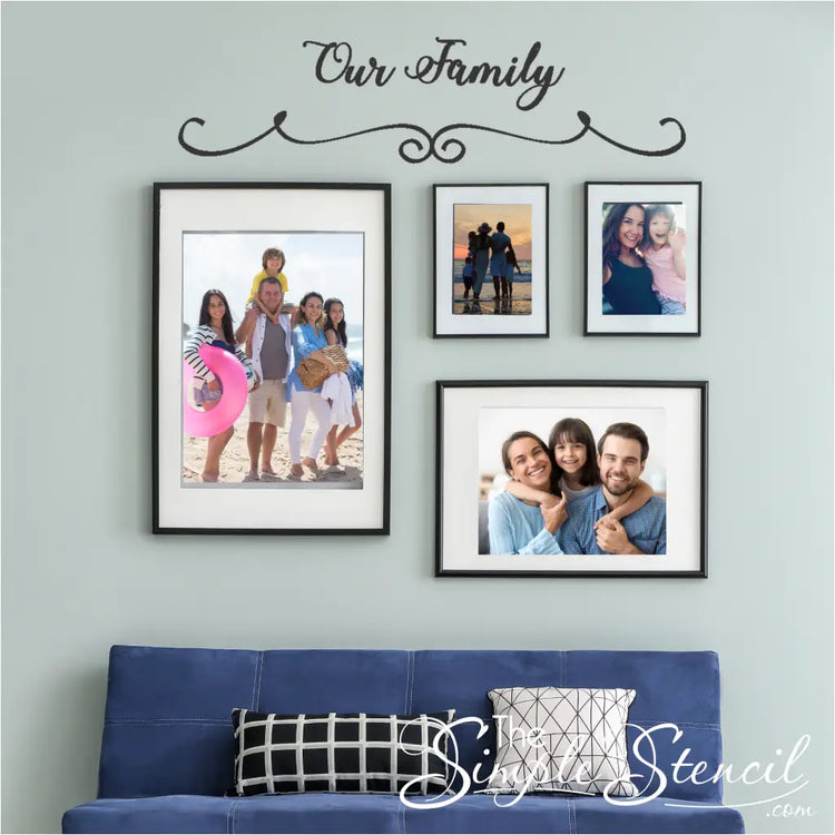 "Our Family" wall decal applied above a family picture wall with various photo frames and sizes.